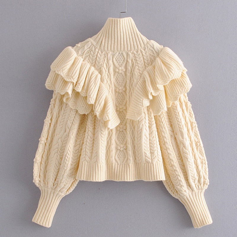 CABLE-KNIT SWEATER WITH RUFFLES