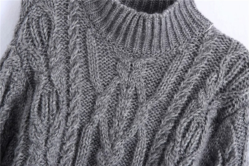 CROPPED CABLE-KNIT SWEATER